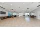 A very spacious meeting room with neutral colors, tile floors, and comfortable seating arrangements at 4050 Oakhurst Dr # 3175, Sarasota, FL 34233
