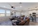 Spacious living area featuring an open layout connecting the kitchen, dining area, and Gathering room at 411 158Th E St, Bradenton, FL 34212