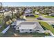 A charming single-Gathering home boasts a well-maintained roof, fenced yard, and a serene neighborhood setting at 4335 Maceachen Blvd, Sarasota, FL 34233