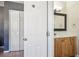 Bathroom features a vanity with a sink and wood cabinets at 4335 Maceachen Blvd, Sarasota, FL 34233