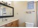 Bathroom featuring a vanity, and modern decorative accents at 4335 Maceachen Blvd, Sarasota, FL 34233
