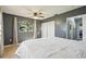 Bedroom with tile floors, bright window, and closet at 4335 Maceachen Blvd, Sarasota, FL 34233