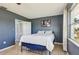 This bedroom features tile floors, and a closet at 4335 Maceachen Blvd, Sarasota, FL 34233