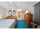 Spacious bedroom showing dual vanities and hallway access at 441 Rubens E Dr, Nokomis, FL 34275