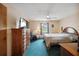 Bedroom showcasing dark wooden furniture and a coordinating color scheme at 441 Rubens E Dr, Nokomis, FL 34275