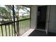 Screened balcony offering views of the community's common areas and a glimpse of neighborhood homes at 4412 Spicewood Dr # D, Bradenton, FL 34208