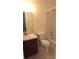 Bright bathroom features a shower-tub combo with a single vanity and neutral tile flooring at 4412 Spicewood Dr # D, Bradenton, FL 34208
