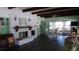 Clubhouse featuring brick fireplace, vaulted ceilings, and an open layout at 4412 Spicewood Dr # D, Bradenton, FL 34208
