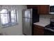 Kitchen featuring stainless steel refrigerator and updated appliances; light and airy space at 4412 Spicewood Dr # D, Bradenton, FL 34208