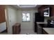 Bright kitchen features stainless steel refrigerator and appliances next to the window for natural lighting at 4412 Spicewood Dr # D, Bradenton, FL 34208