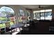 Screened-in patio with lake views and seating at 4412 Spicewood Dr # D, Bradenton, FL 34208