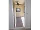 A cozy sun room features carpeting, a ceiling fan, and natural light at 4412 Spicewood Dr # D, Bradenton, FL 34208