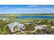 Scenic aerial view of the community golf course and lake at 4721 Tortona Ct, Bradenton, FL 34211