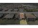 Aerial view of a house with fenced backyard and landscaping at 4721 Tortona Ct, Bradenton, FL 34211