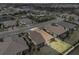 Aerial view of a home with fenced yard and landscaping at 4721 Tortona Ct, Bradenton, FL 34211