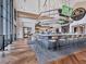 Upscale bar area with stools, television and decorative lighting at 4721 Tortona Ct, Bradenton, FL 34211