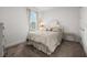 Cozy bedroom featuring neutral decor, plush carpeting and a comfortable bed at 4721 Tortona Ct, Bradenton, FL 34211
