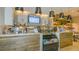 Charming cafe with coffee bar, display case, modern lighting, and wood accents at 4721 Tortona Ct, Bradenton, FL 34211