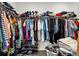 Organized walk-in closet with shelving and hanging rods provides ample storage space at 4721 Tortona Ct, Bradenton, FL 34211