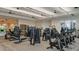 Well-equipped gym with modern exercise machines and ceiling fans, promoting an active lifestyle at 4721 Tortona Ct, Bradenton, FL 34211