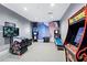 Colorful game room with arcade games and fun wall decor at 4813 Sparkling Sea Ln, Lakewood Ranch, FL 34211