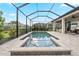 Screened-in pool with a spa, a water view, and an outdoor entertainment area at 4813 Sparkling Sea Ln, Lakewood Ranch, FL 34211