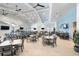 Spacious restaurant with ceiling fans, tables and chairs, TVs, and a full bar at 4813 Sparkling Sea Ln, Lakewood Ranch, FL 34211