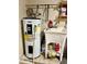 Water heater and utility sink in the garage at 503 Philodendron, Punta Gorda, FL 33955