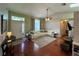 Comfortable living room featuring hardwood floors and a large sectional sofa at 503 Philodendron, Punta Gorda, FL 33955