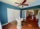 Bright living room with hardwood floors and a decorative glass table at 503 Philodendron, Punta Gorda, FL 33955