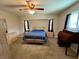 Comfortable bedroom with neutral tones and ample closet space at 503 Philodendron, Punta Gorda, FL 33955