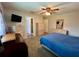 Well-lit bedroom with wicker furnishings and soft carpeting at 503 Philodendron, Punta Gorda, FL 33955
