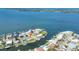 Aerial view showcases waterfront home with dock and waterway access at 5112 Arlington Rd, Palmetto, FL 34221