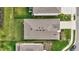 Aerial view highlighting the home's roof and surrounding landscaping in a residential community at 5313 Halewood Ct, Bradenton, FL 34211