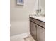 Stylish bathroom featuring a vanity with granite countertop, modern fixtures, and neutral color scheme at 5313 Halewood Ct, Bradenton, FL 34211