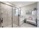 Modern bathroom featuring a glass-enclosed shower, soaking tub, and elegant decor, creating a serene and luxurious atmosphere at 5313 Halewood Ct, Bradenton, FL 34211