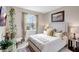 Cozy bedroom with natural light and stylish decor at 5313 Halewood Ct, Bradenton, FL 34211