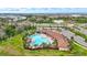 Relaxing community pool features lounge chairs and lush landscaping, providing a tranquil escape at 5313 Halewood Ct, Bradenton, FL 34211