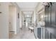 Elegant entryway with tile flooring and a view into the living area at 5313 Halewood Ct, Bradenton, FL 34211