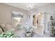 Bright living room featuring modern decor, a chandelier, and an open layout for seamless entertaining at 5313 Halewood Ct, Bradenton, FL 34211