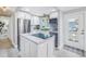 Stylish kitchen with a center island, modern appliances, and a bright, airy atmosphere at 5892 17Th W St # C25, Bradenton, FL 34207