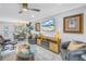 Open living room with dining area, modern decor, and plenty of natural light at 5892 17Th W St # C25, Bradenton, FL 34207