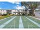 Enjoy the community shuffleboard courts, shaded and ready for play on this property at 5892 17Th W St # C25, Bradenton, FL 34207