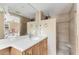 Renovated bathroom featuring a vanity, shower, and essential fixtures awaiting final touches to maximize its elegance at 6140 Midnight Pass Rd # A10, Sarasota, FL 34242