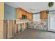 Kitchen in the process of being renovated with new fixtures and appliances with custom cabinetry at 6140 Midnight Pass Rd # A10, Sarasota, FL 34242