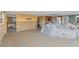 Open-concept living room with exposed walls and construction elements at 6140 Midnight Pass Rd # A10, Sarasota, FL 34242