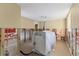 Unfinished living room with exposed insulation, providing a blank canvas for remodeling and customization at 6140 Midnight Pass Rd # A10, Sarasota, FL 34242