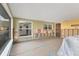 Living room renovation with large windows providing abundant natural light at 6140 Midnight Pass Rd # A10, Sarasota, FL 34242