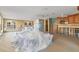 Living space with construction materials and partially exposed walls, showcasing ongoing renovation at 6140 Midnight Pass Rd # A10, Sarasota, FL 34242