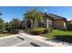 Exterior shot of a community center with a welcoming walkway, lush landscaping, and ample parking at 815 Rosemary Cir, Bradenton, FL 34212